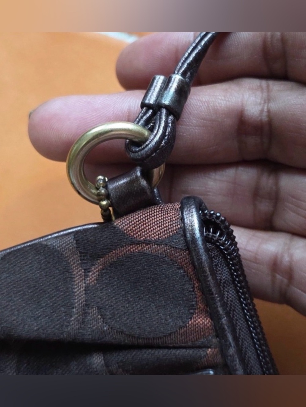 Coach Brown Poppy Signature
Wristlet with Gold Plaque w/ Original Hang Tag GUC - Picture 7 of 14